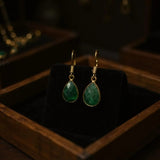 Emerald dangle earrings