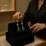 Emerald shell dangle earrings