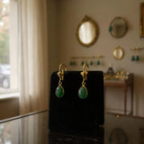 Emerald shell dangle earrings