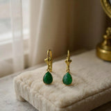 Emerald shell dangle earrings