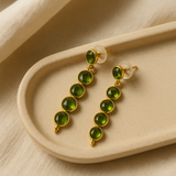 Peridot riviere earrings