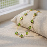 Seven stone peridot clover necklace