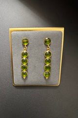 Peridot riviere earrings