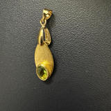 Peridot petal pendant